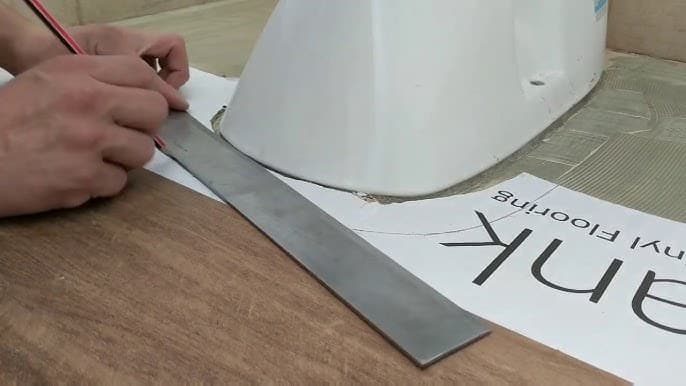 Templating or scribing flooring around an awkward shape