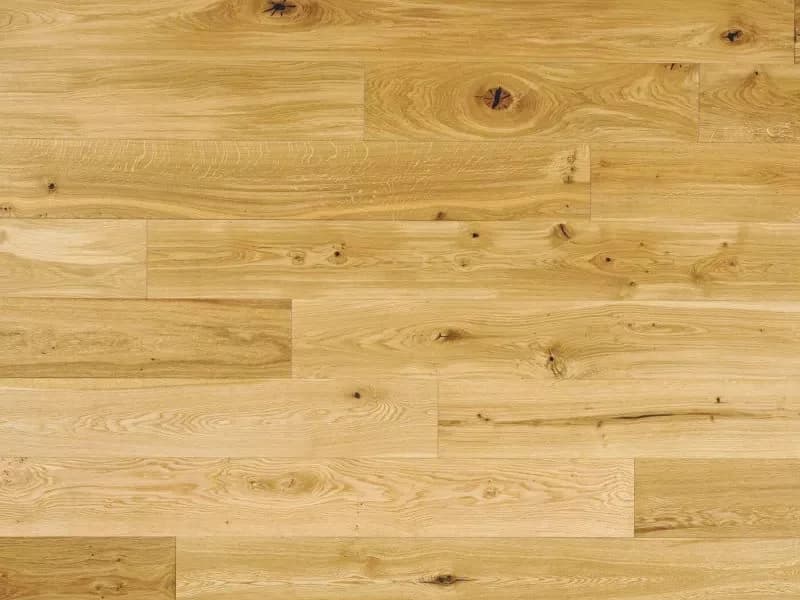 Natural oak engineered wood flooring, showing the grain and knots of real timber